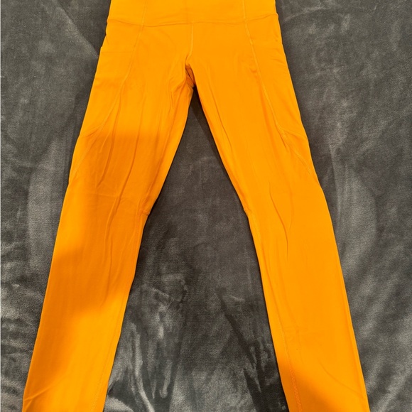 Athleta Vibrant Orange Leggings - Picture 1 of 4